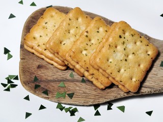 Sandwich crackers with cheese cream on wooden board. Top View. Flat Lay
