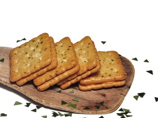 Sandwich crackers with cheese cream on wooden board