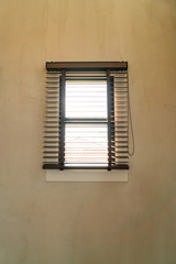 Fototapeta premium window on wall with sunlight