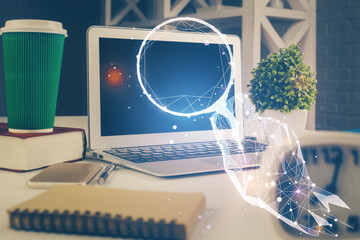 Desktop computer background in office and start up theme hologram drawing. Double exposure. Startup concept.