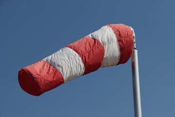 windsock,a conical textile tube that resembles a giant sock and can be used as a basic guide to...