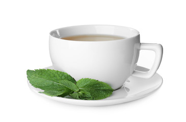 Cup with hot aromatic mint tea isolated on white