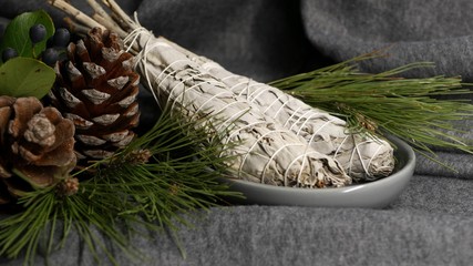 Dried white sage smudge stick, relaxation and aromatherapy. Smudging during psychic occult...