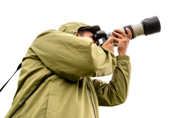 Fototapeta premium Photographer with telephoto lens isolated on white background