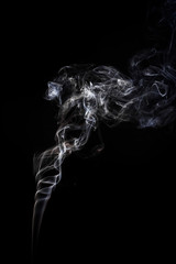 Freeze motion of smoke on black background.  Abstract vape clouds.
