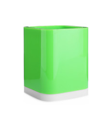Green plastic holder isolated on white. Stationery for school