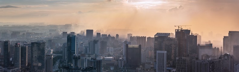 Chengdu, Sichuan province, China - Aug 19, 2020 : Chengdu backlight skyline panorama aerial view with clouds on the city