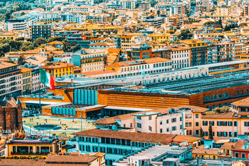 Fototapeta premium Beautiful landscape above urban and historical view of the Florence from Giotto's Belltower.Main Florence railways station- Firenze Santa Maria Novella.