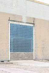 Glass block window in an industrial concrete wall