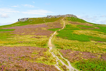 Long winding path to Higger Tor on a summer day in Derbyshire