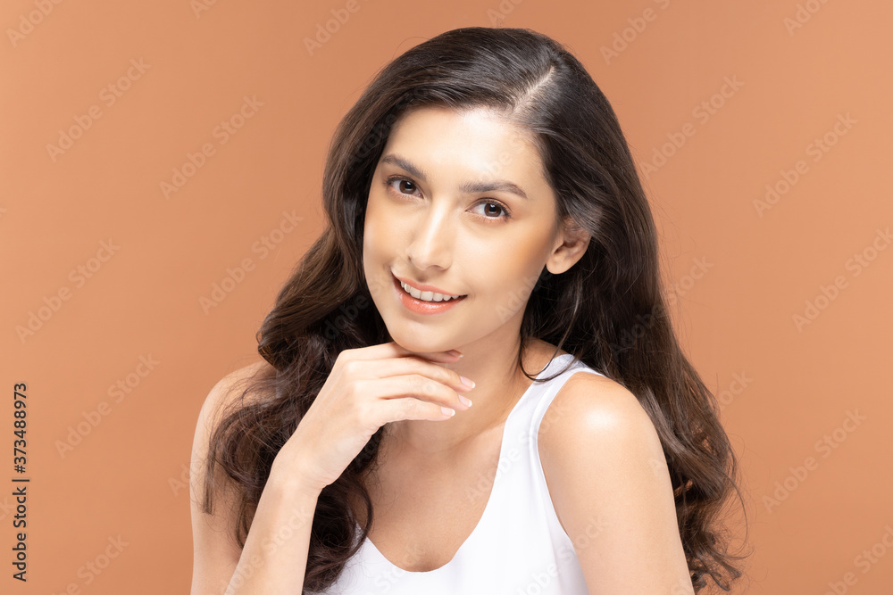 Wall mural beautiful asian woman touching chin smile with clean and fresh skin happiness and cheerful with posi