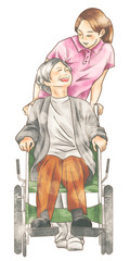 介護スタッフと車いすの高齢者