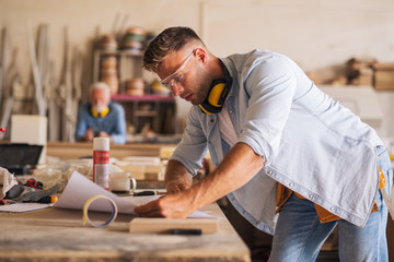 Carpenter trying to understand blueprint