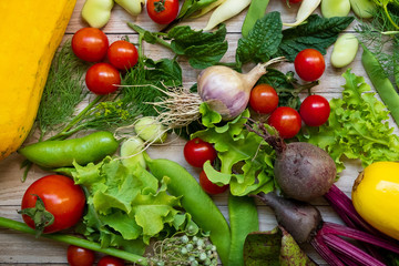cherry tomatoes on wooden table background