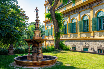 decorated fountain with a boy in Pecs hungary
