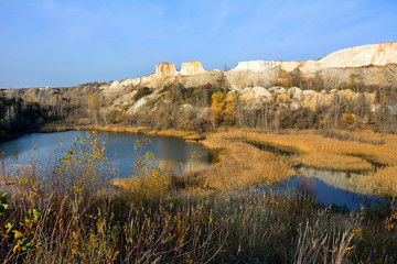 Picturesque landscape of white cliffs and blue lakes.