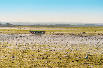 Boat Marooned in Estuary at Low Tide