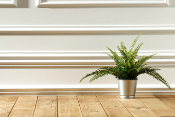 Wooden table in the morning with a flower in the kitchen
