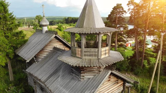 Russian aerial panoramas of the village with a Christian church.