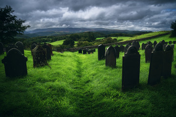 Moody gravestones in a Cemetery in Wales, UK