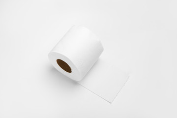 Roll of white  toilet tissue paper on isolated white background.
