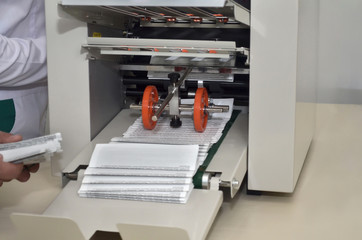Printing machine for printing instructions for medicines in a pharmaceutical factory