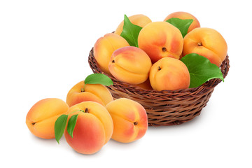 apricot fruit in Wicker basket isolated on white background. Clipping path and full depth of field