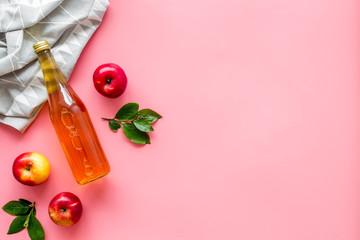 Bottle of apple organic vinegar or cider. Top view, copy space