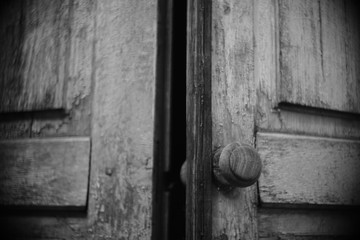 old wooden doors with round handle