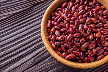 Fresh organic natural beans on wooden rustic background