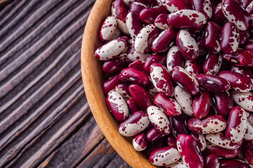 Fresh organic natural beans on wooden rustic background