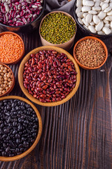 Fresh organic natural beans on wooden rustic background