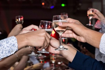 man and woman toasting with champagne