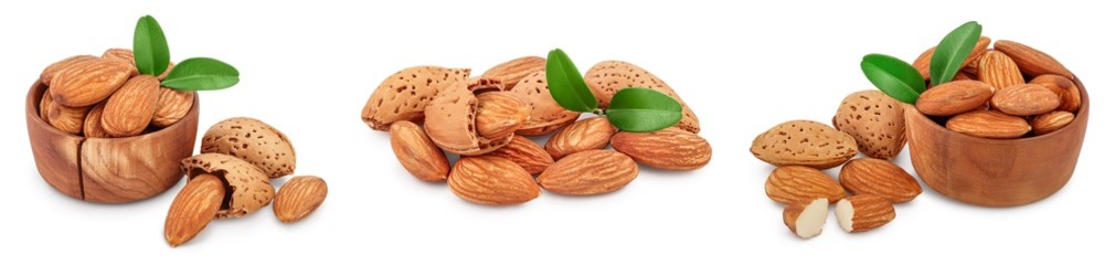 Almonds nuts with leaves isolated on white background with clipping path and full depth of field. Set or collection