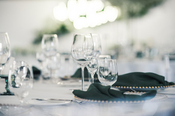 Wedding table with empty wine glass