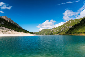 View of Fedaia lake at Fedaia pass in Italy