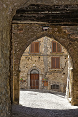 A narrow street among the old houses of Vallecorsa, a medieval village in the lazio region.