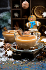 winter treats, spiced masala tea and gingerbread man cookies, vertical