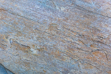 Natural Stone Wall Background Texture with Rust Tones