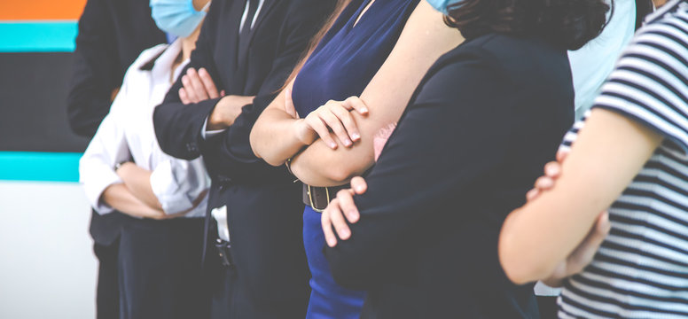 group of diversity business people wearing protective medical masks for protection from virus in office