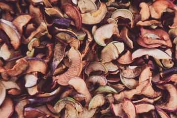 Natural dry Apple slices. Autumn background of cut dried fruit.