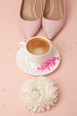 shoes, flowers and coffee and space for text.