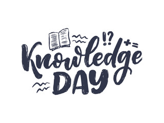 Obraz premium Hand drawn lettering phrase - Knowledge Day. Holiday celebration artwork for greeting cards, social network and web design. Vector