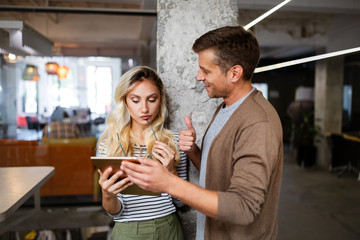 Creative brainstorming. Happy business people, designers, architects working as a team in office