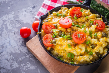 delicious pasta and cheese casserole in a cast iron skillet
