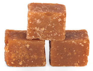 palm sugar or Jaggery on white background