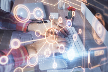 Social network theme hologram with businessman working on computer on background. Concept of world wide web. Double exposure.