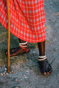 Close up of Maasai warrior with a traditional sandals