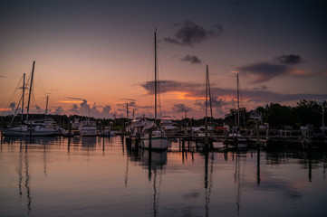 Sailboats at a marina at dawn in Beaufort North Carolina.