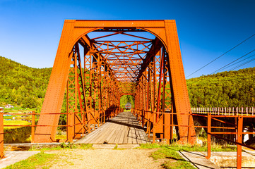 Old metal train bridge at the Circum-Baikal Railway, a historic rail road on Lake Baikal, Russia
